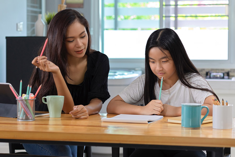 student and tutor together at a desk in Tampa